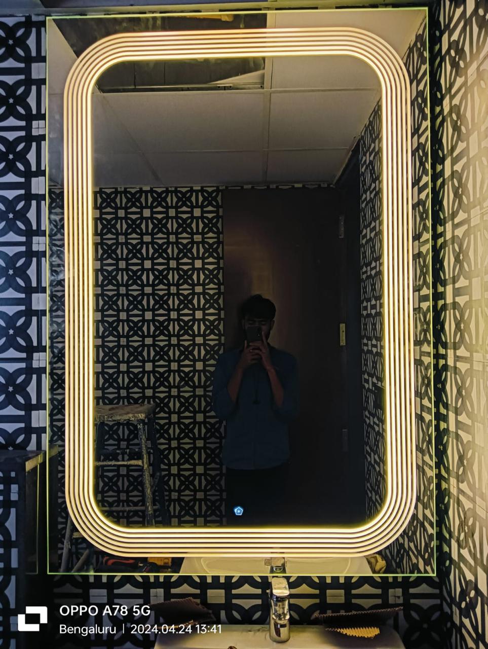 Finished bathroom vanity mirror with rounded rectangular layered LED lighting